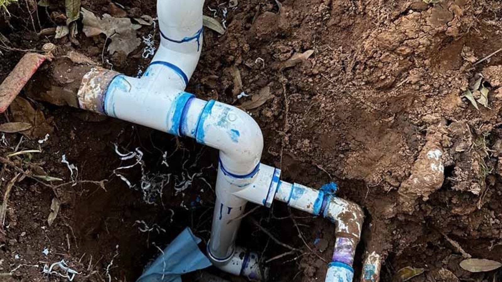 Residential plumbing line repair in progress